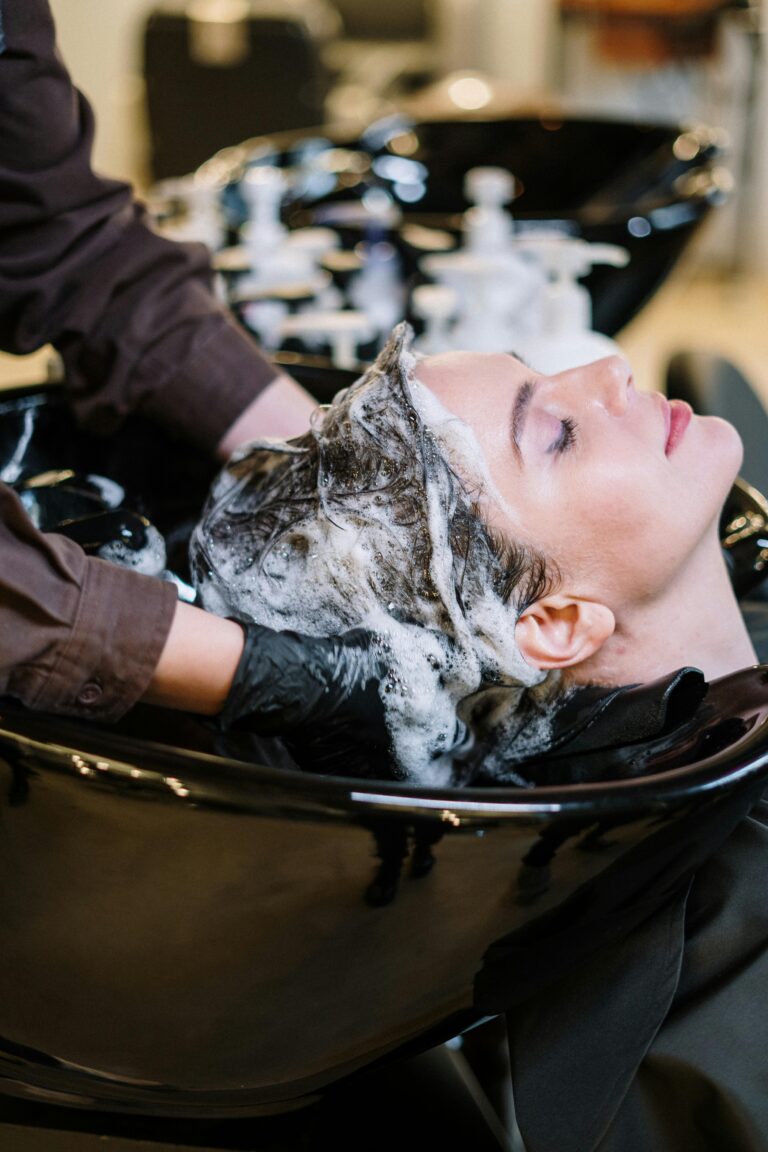 Woman applying deep conditioning hair mask for 10-minute treatment